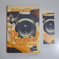 THE PHOTOGRAPHER